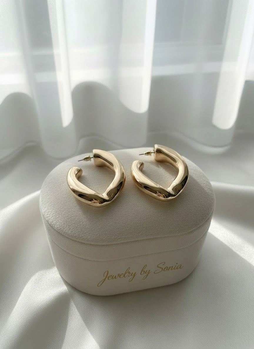 Boucles d’oreilles hoops coudées argentées