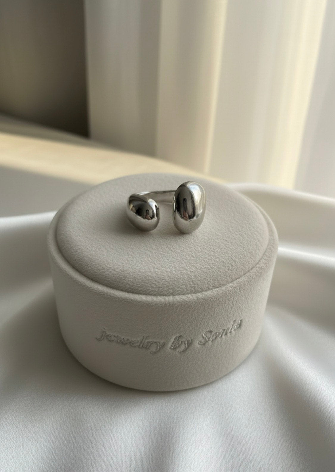 Bague double perle bombée argentée