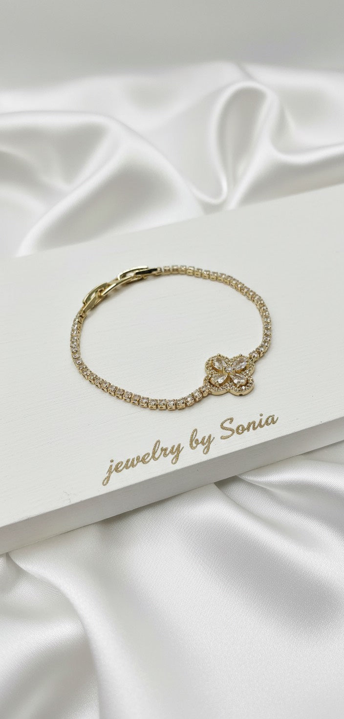 Bracelet Tennis Doré Fleur – Cristaux Étincelants
