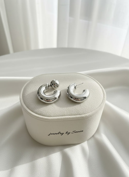 Boucles d’oreilles coudées minimalistes argentées