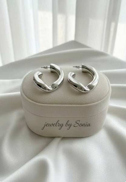 Boucles d’oreilles hoops coudées argentées